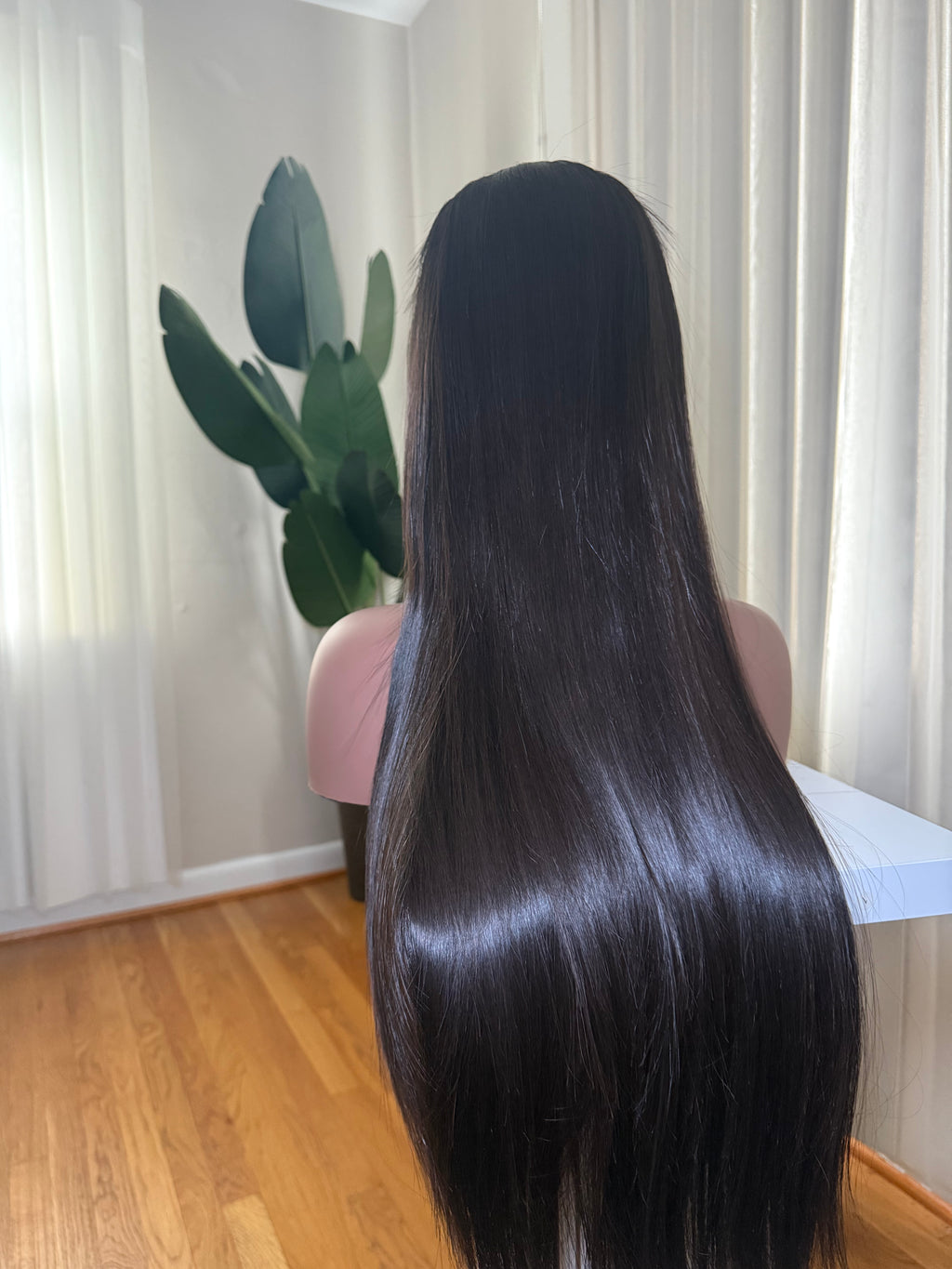 HER Vietnamese bone straight wig - side length view on mannequin